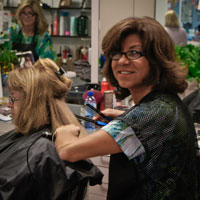 Hair stylist Monica working